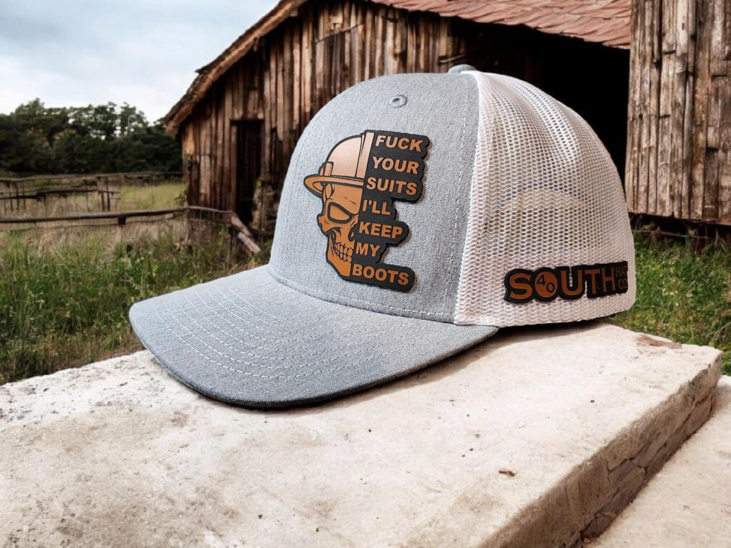 Gray and White Boots Over Suits Trucker Hat