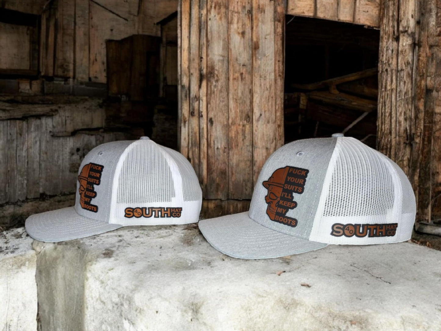 Gray and White Boots Over Suits Trucker Hat